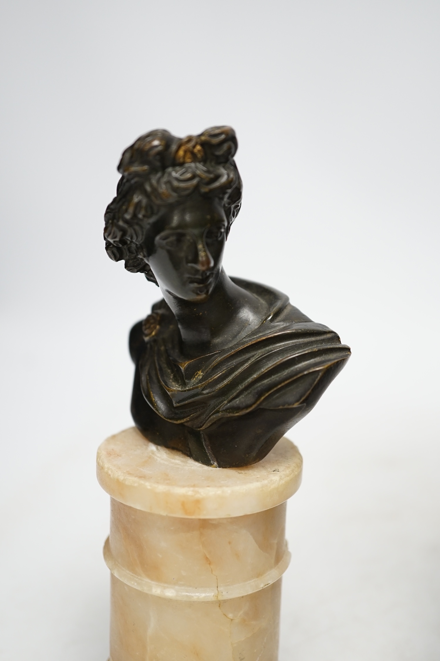 After Isaak Duchemin, a bronze figure of Pan, together with a bust of Apollo, tallest 37cm. Condition - fair